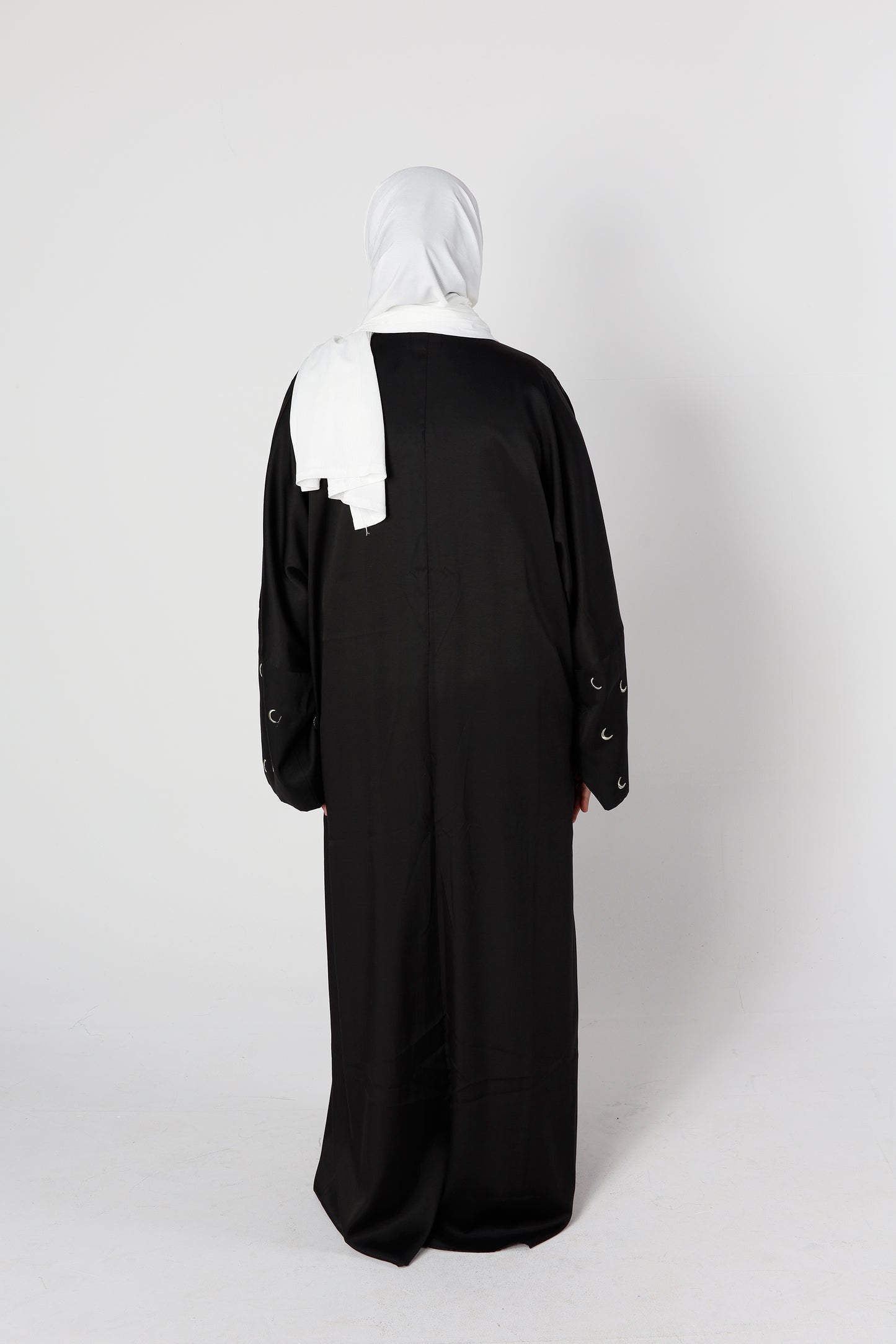 Back profile of black Crescent abaya with flowing modest design – Qalbi Australia