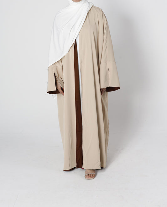 Front view of Riwaaya double-sided abaya desert sand – Qalbi modest clothing