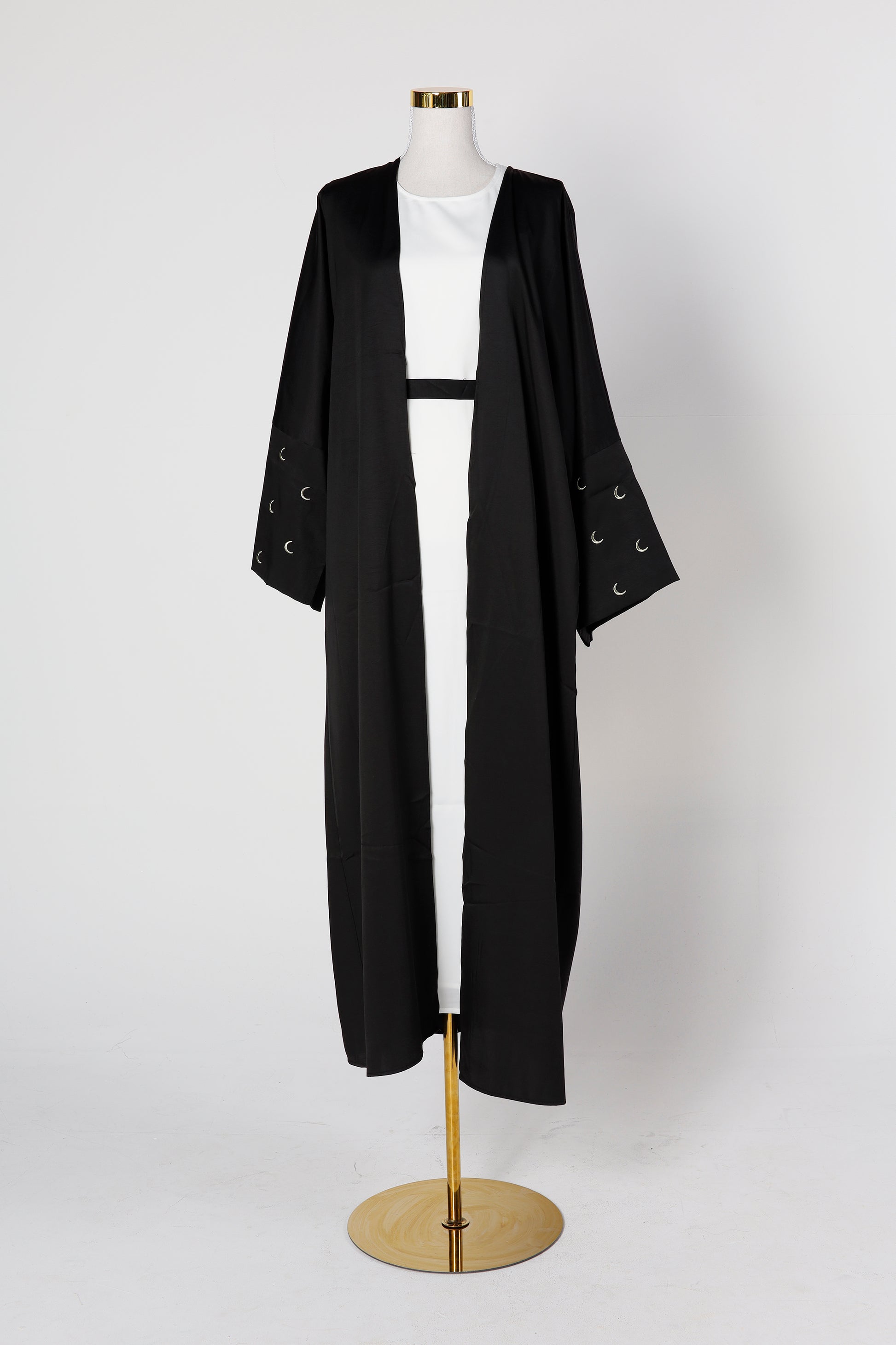 Black Crescent abaya with moon embroidery displayed on mannequin – Qalbi modest clothing