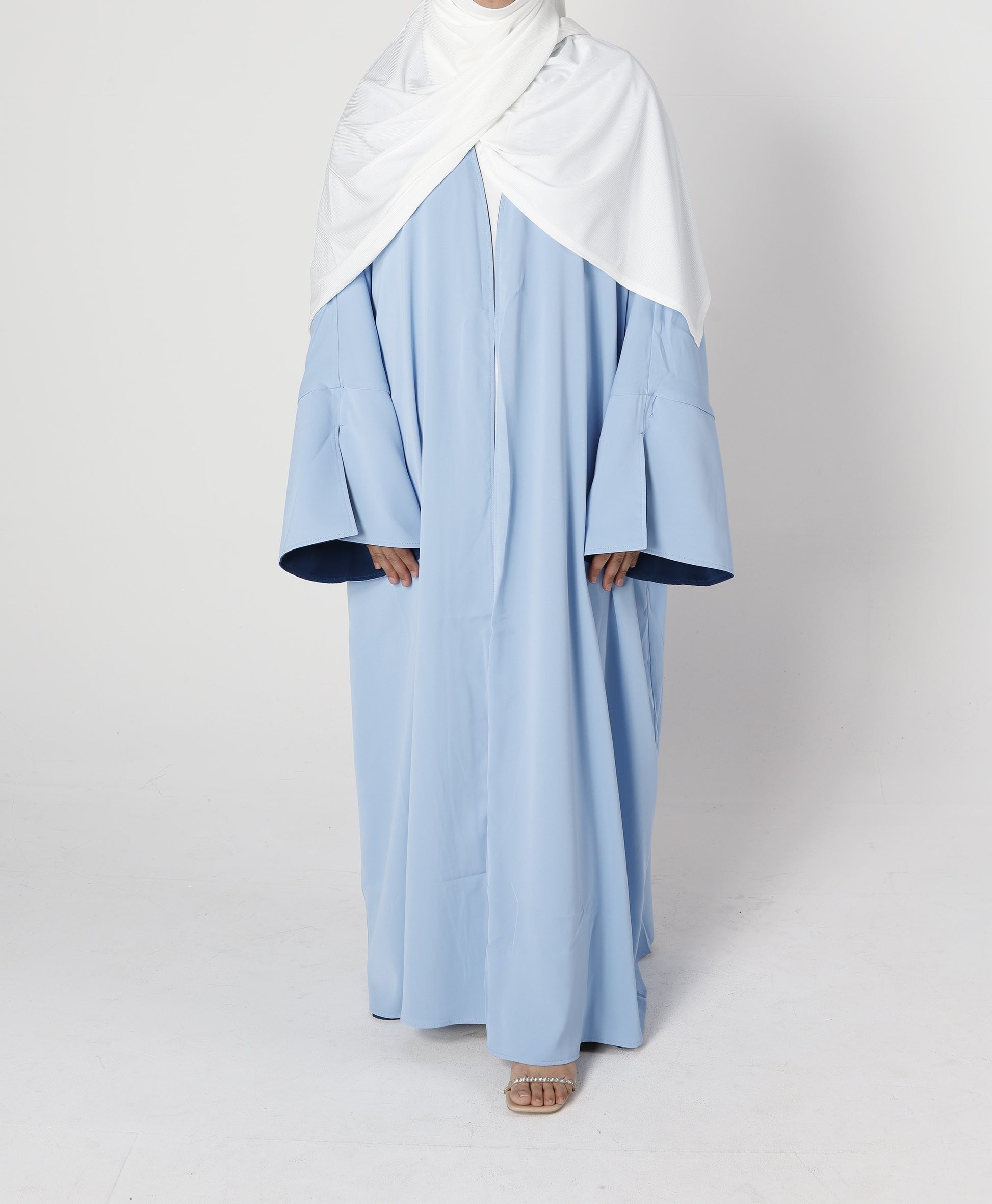 Front view of Riwaaya double-sided abaya in mblue haze – Qalbi modest wear