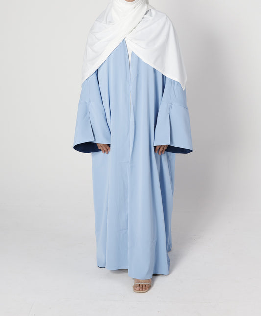 Front view of Riwaaya double-sided abaya in mblue haze – Qalbi modest wear