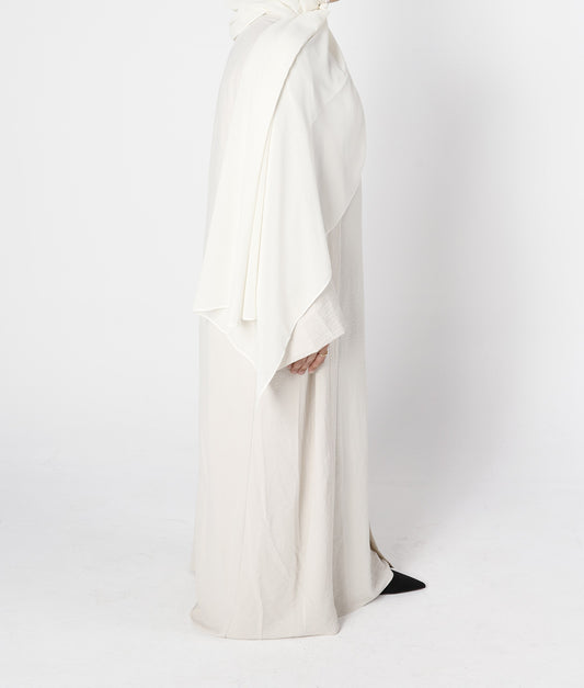 Side profile of ivory cream crinkle abaya 3-piece layered set – Qalbi modest wear