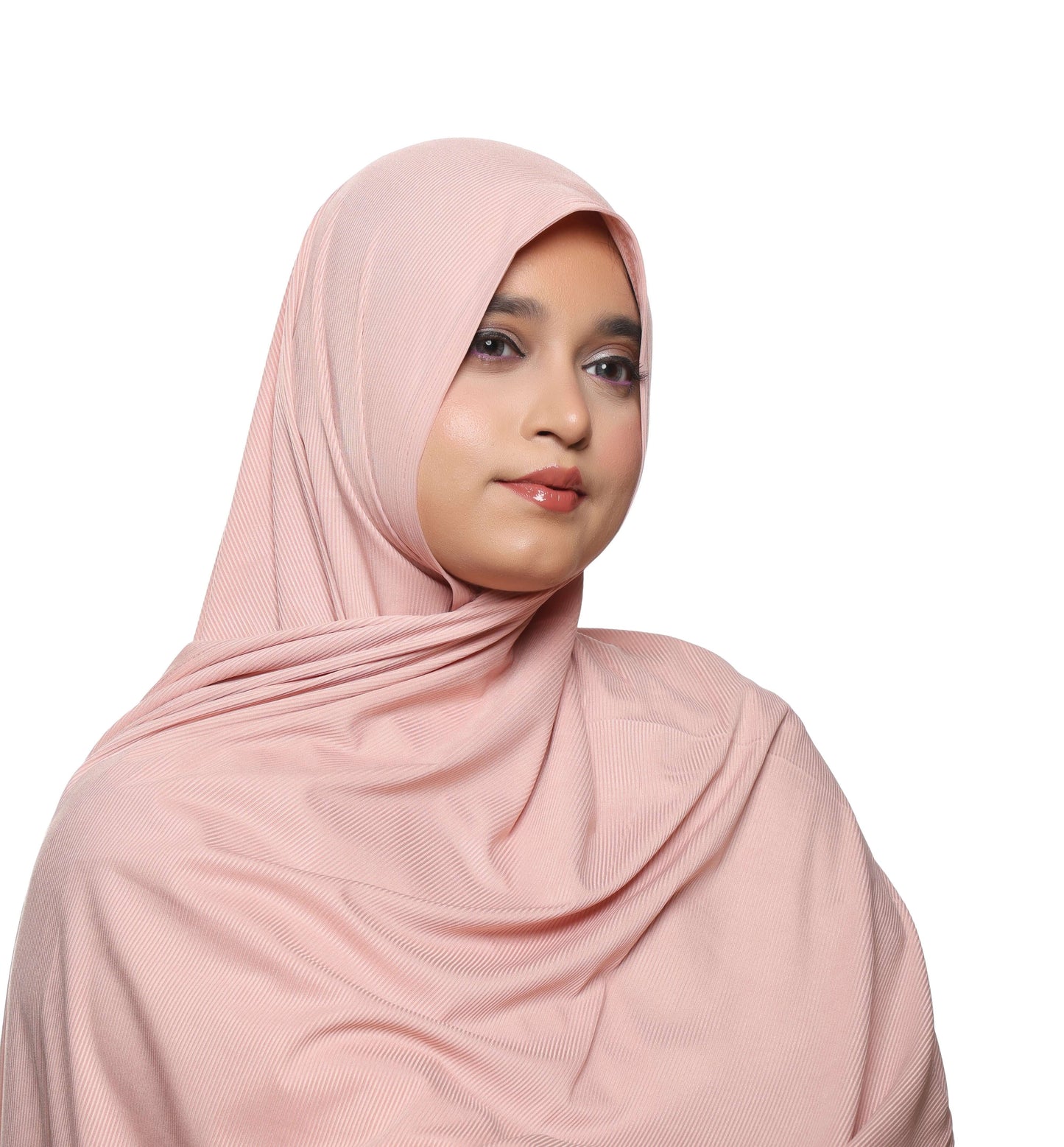 Close-up texture highlight of dusty pink textured jersey hijab fabric – Qalbi