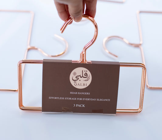 Gold rectangular hijab hanger made from high-quality iron, designed to keep hijabs neat and wrinkle-free.