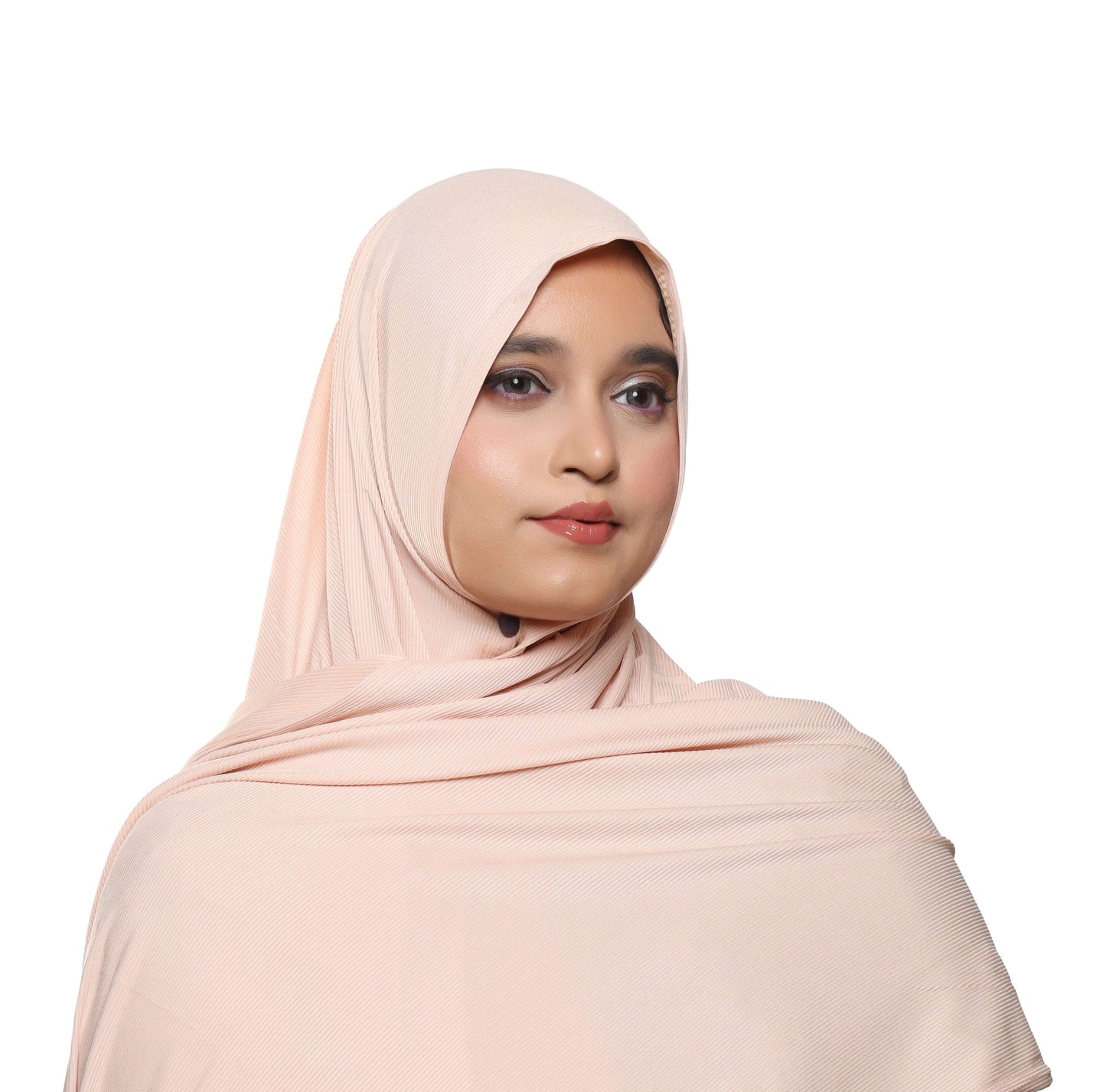Close-up fabric detail of peach blush textured jersey hijab texture – Qalbi hijab scarf