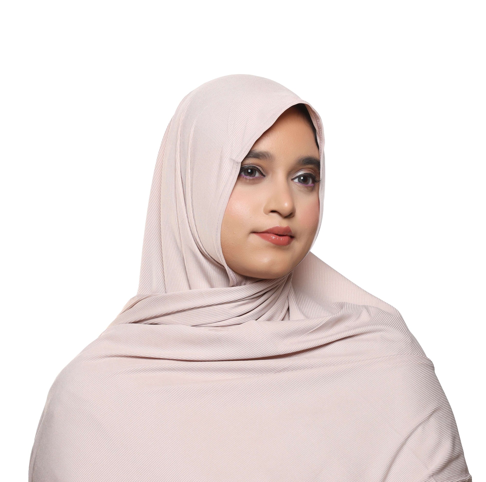 Flat lay of hijabs stacked including powder pink textured jersey hijab – Qalbi