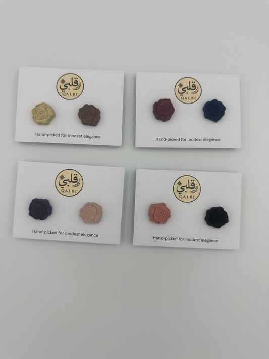 Four pairs of Hijab Magnets Rose on white cards with a brand logo on a light gray background