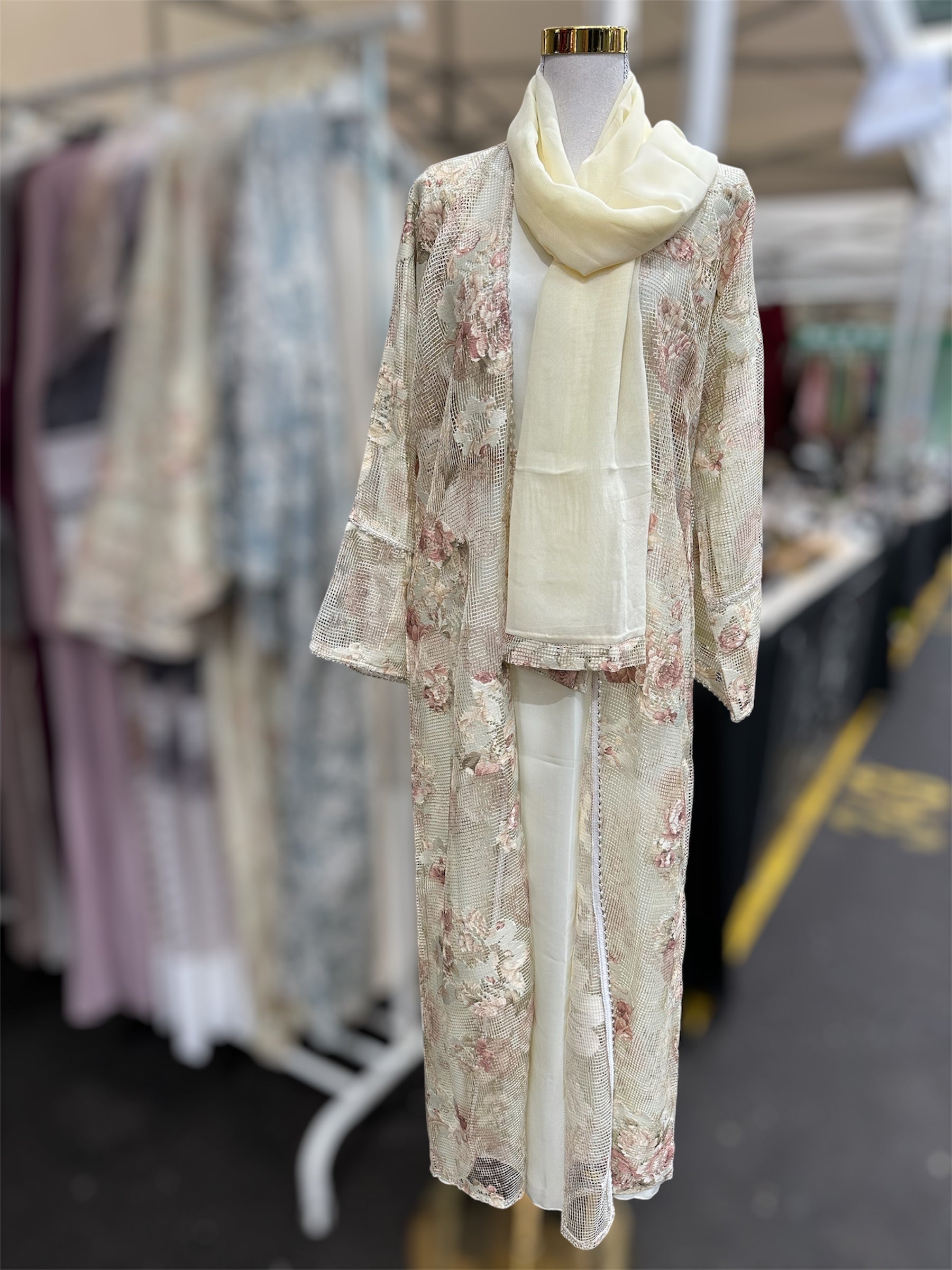 Butter Yellow abaya displayed indoor modest wear collection