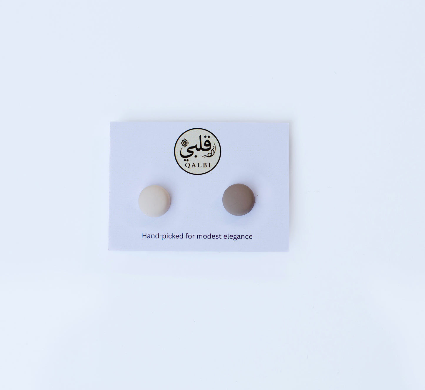 Soft-tone magnetic pins arranged on a dark surface