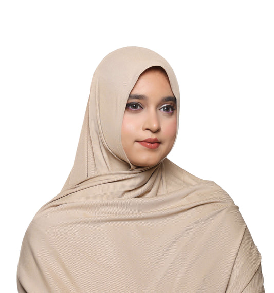 Close-up fabric detail of champagne beige textured jersey hijab texture – Qalbi modest wear