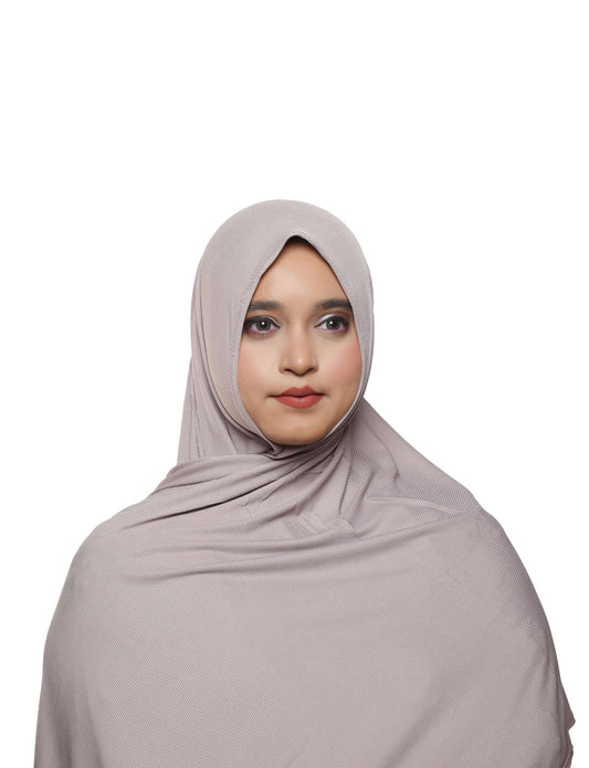 Close-up texture highlight of dusty purple textured jersey hijab fabric – Qalbi