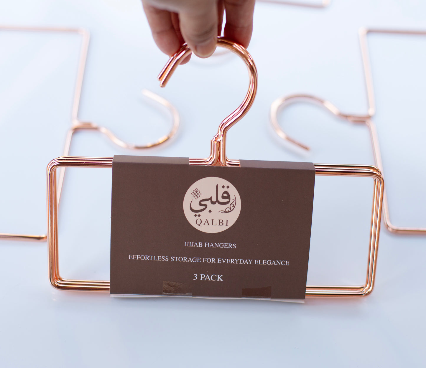 Gold rectangular hijab hanger made from high-quality iron, designed to keep hijabs neat and wrinkle-free.