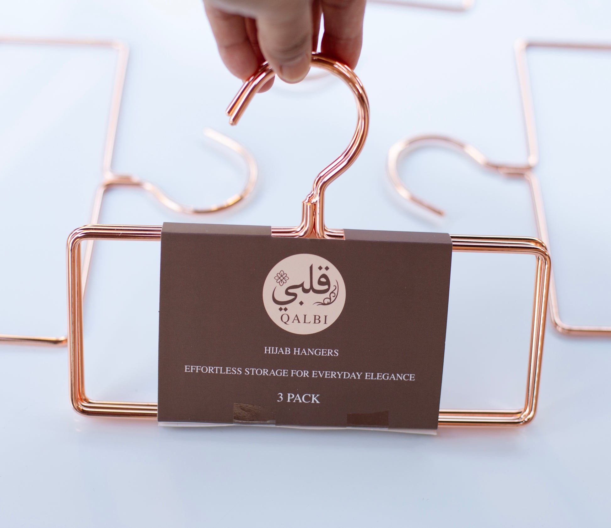 Gold rectangular hijab hanger made from high-quality iron, designed to keep hijabs neat and wrinkle-free.