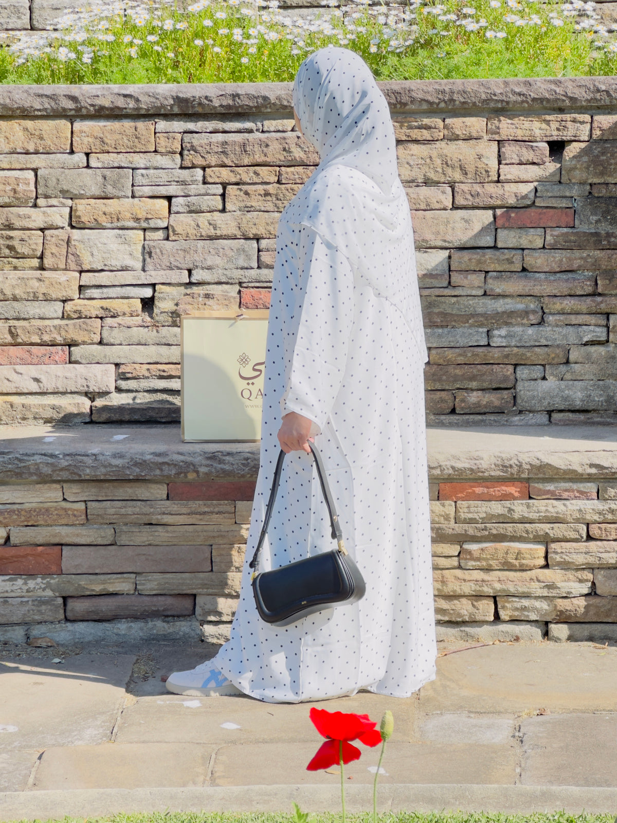 Soft White polka dot abaya side view