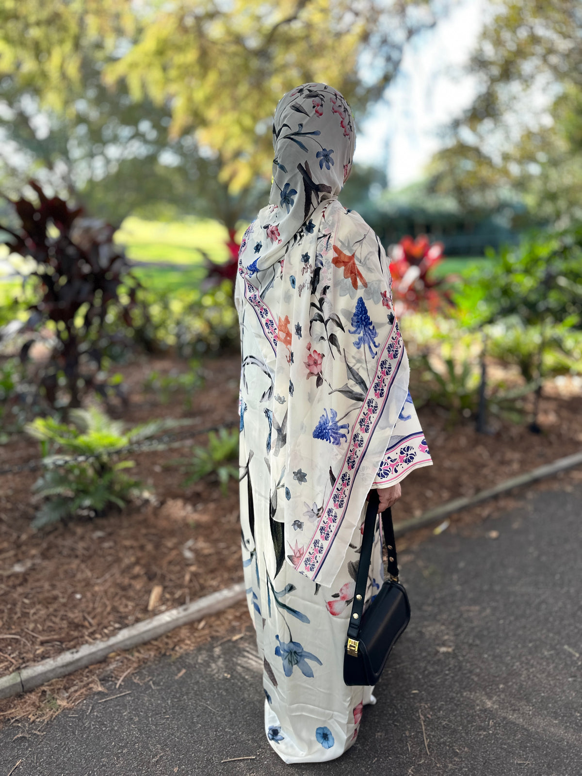 Botanical Bloom Buttercream floral Armani Silk abaya with matching hijab by Qalbi