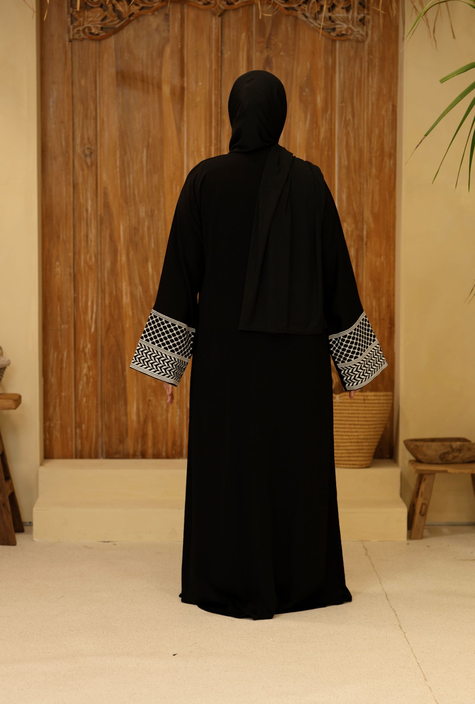 Black modest abaya rear view with clean finish