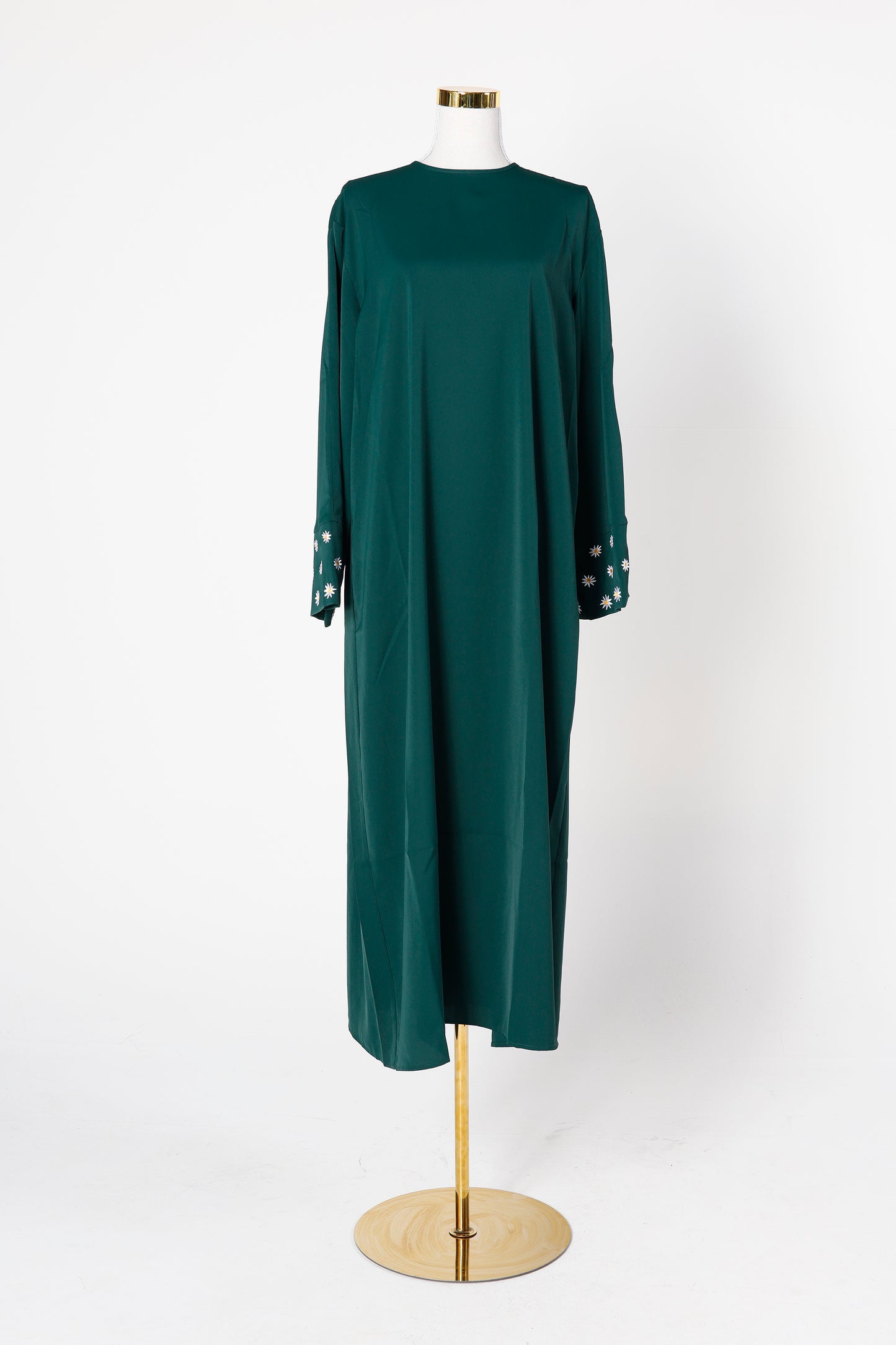 Emerald Zahra abaya displayed on mannequin – Qalbi modest fashion