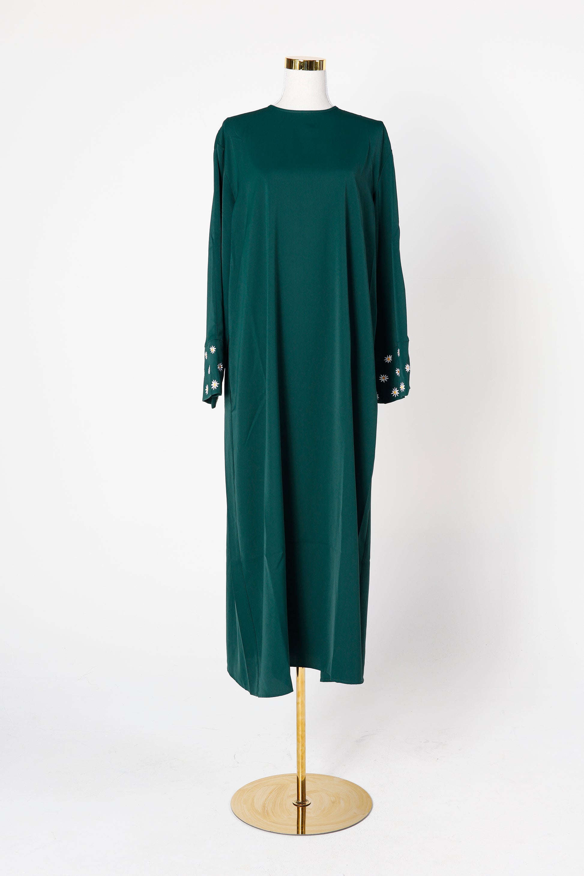 Emerald Zahra abaya displayed on mannequin – Qalbi modest fashion
