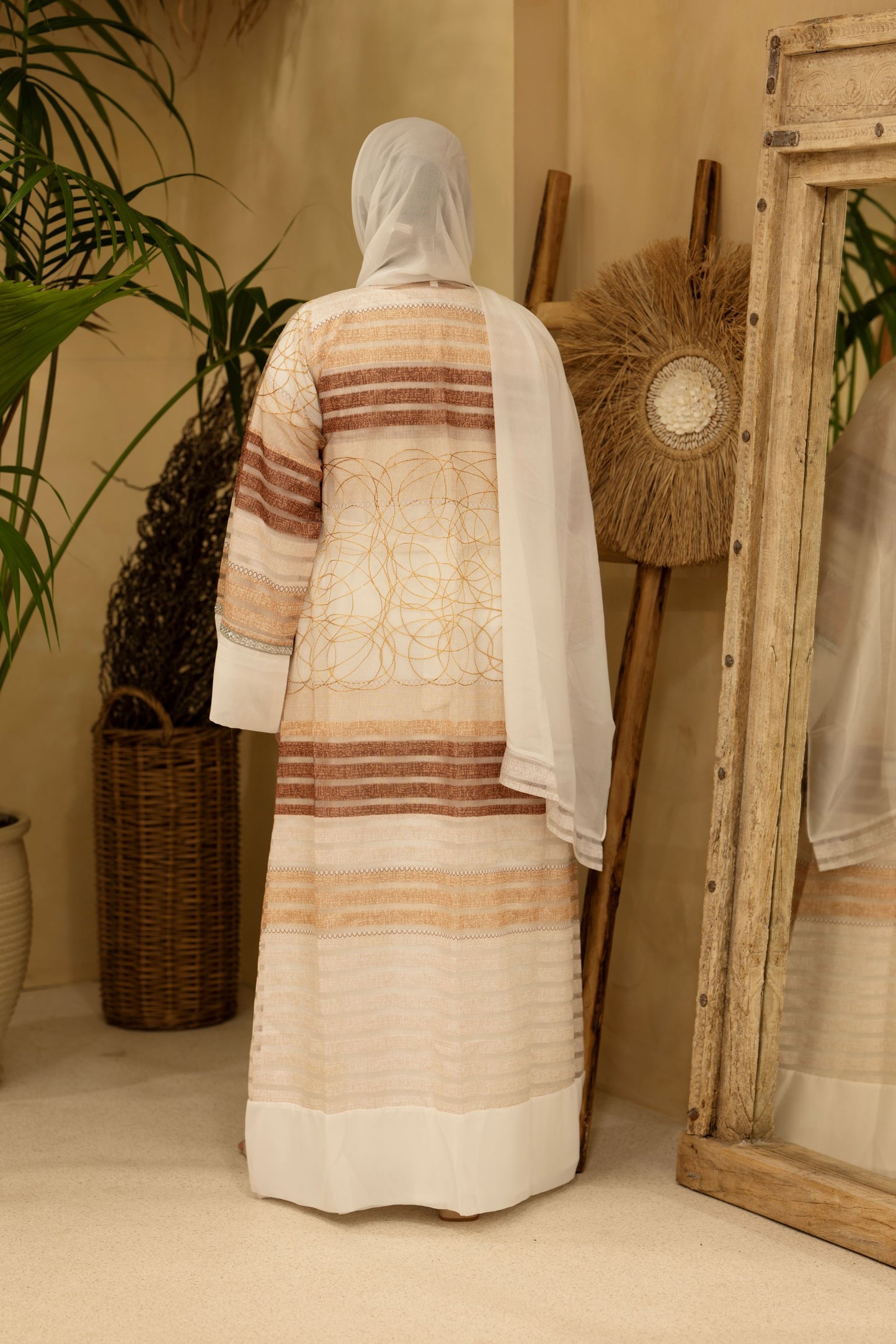 Noor Abaya Bronze Glow side pose highlighting elegant drape