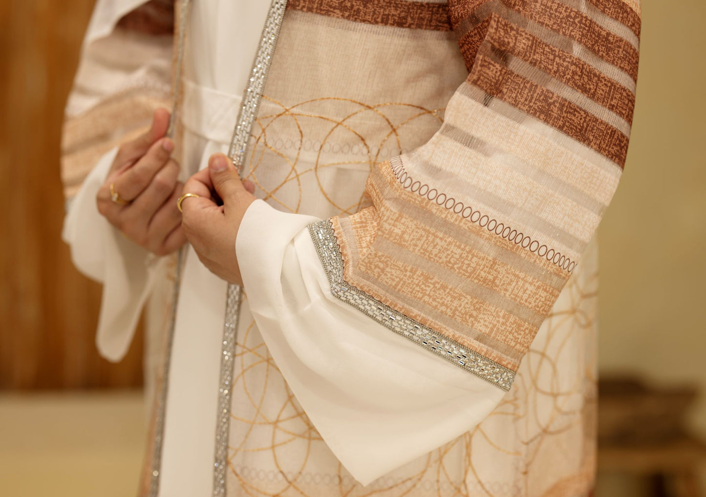 Noor Abaya Bronze Glow fabric detail from Qalbi Noor Al-Eid Collection
