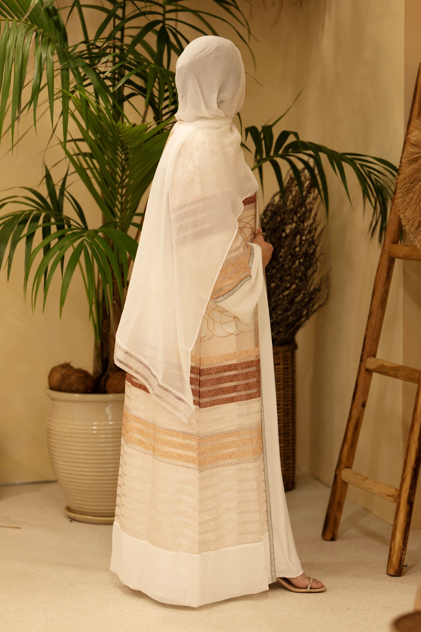 Back view showing graceful fall and rich bronze fabric