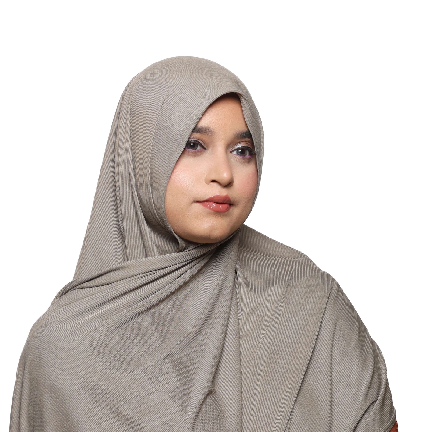 Close-up texture highlight of olive green textured jersey hijab fabric – Qalbi